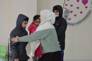 providing the kids in winter time with jackets and some clothes.