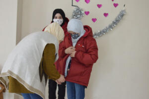 providing the kids in winter time with jackets and some clothes.