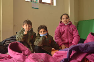 providing the kids in winter time with jackets and some clothes.