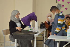 providing the kids in winter time with jackets and some clothes.