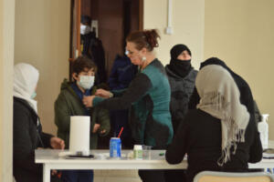 providing the kids in winter time with jackets and some clothes.