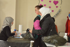 providing the kids in winter time with jackets and some clothes.