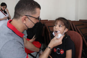 Dental check up and oral hygiene session along with tips on how to keep their teeth healthy with Dr Ammar Mosa.